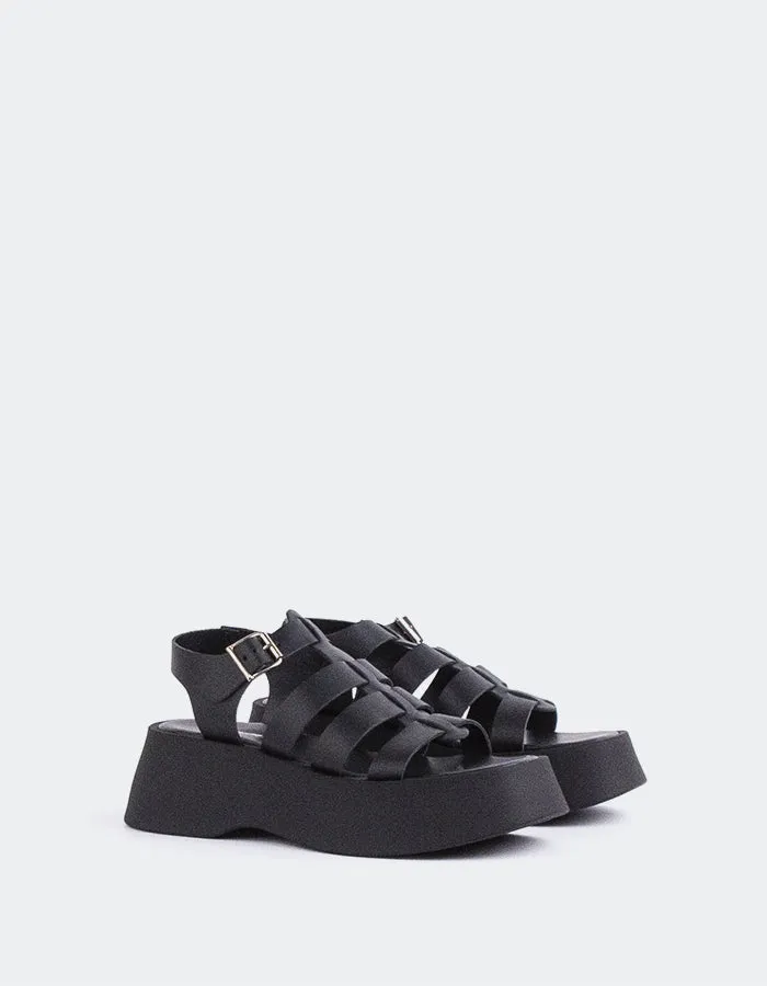 Selbstbewusstes schwarzes Leder