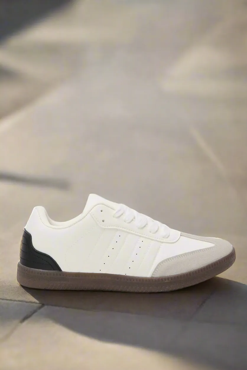 Herren Sneaker aus beigem Material mit Blockabsatz